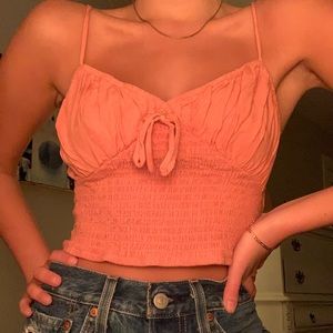Cropped melon colored tank top